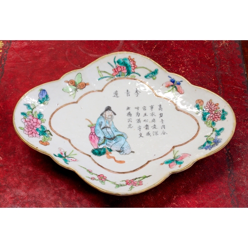 64 - A 19th century Chinese lozenge-shaped pedestal dish decorated in enamels: seated male figure dressed... 