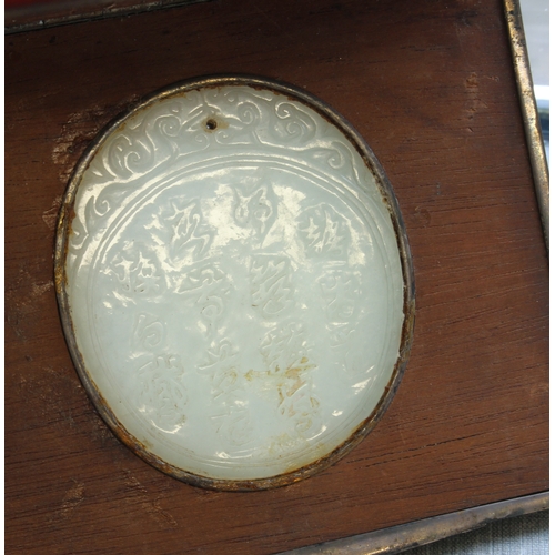 102 - A 19th century white metal and red enamelled box (probably French (the head of Minerva to the unders... 