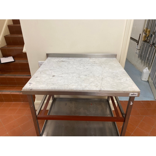 1 - 25mm thick Marble topped, freestanding, stainless steel trolley. On four caster wheels with two lowe... 