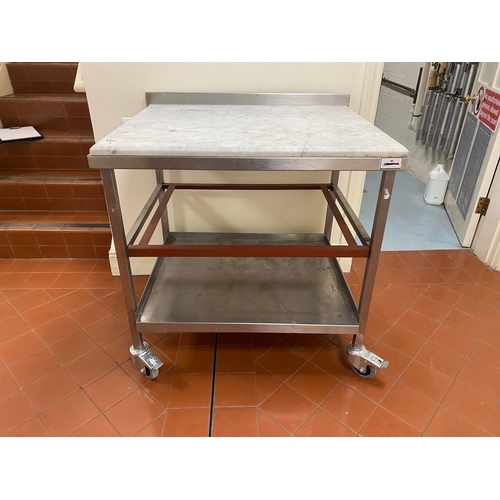 1 - 25mm thick Marble topped, freestanding, stainless steel trolley. On four caster wheels with two lowe... 