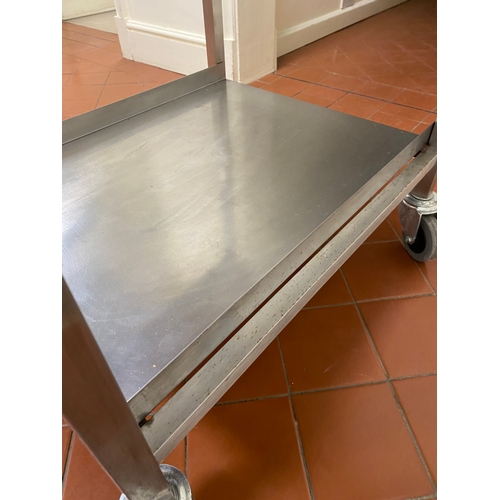 2 - Free-standing stainless-steel trolley. 4 caster wheels, with back upstand and a bottom tray. 
 76cm ... 