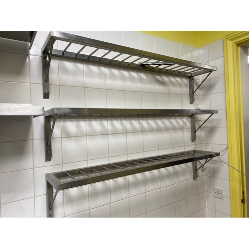 4 - 3 wall mounted stainless-steel shelving racks. 16 rings. 
 25cm D 130cm W 28cm H