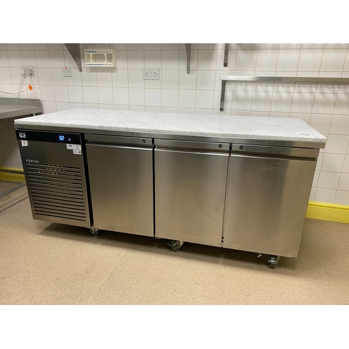 6 - Foster Eco Pro G2, 3 doors under counter fridge unit with a marble top on six caster wheels and five... 