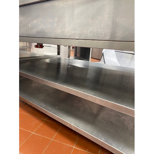 22 - Two stainless-steel, free-standing work units. Two lower shelves with two end draws. On four caster ... 