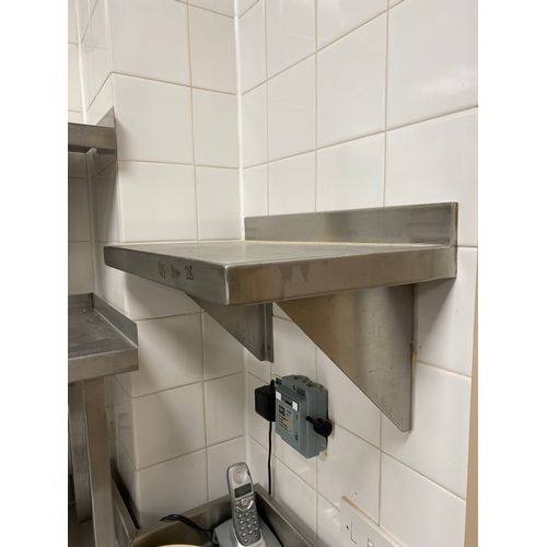 28 - Stainless steel, wall mounted shelving unit with two support brackets. 
 500mm L 300mm D 
 Back stan... 