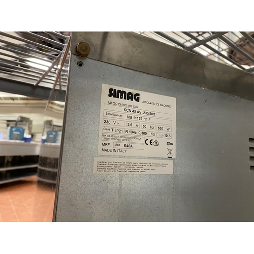 29 - Simag SCN 45 Ice machine on feet. SCN 45 as 230/50/1 
 Serial No. 1159 11F 
 490mm W 580mm D 950mm H