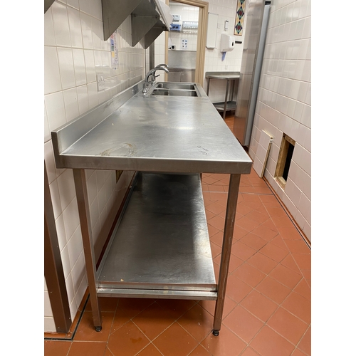 30 - Double stainless steel sink unit with work surface on the left. One mono tape per sink. One shelf un... 