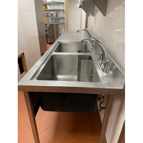 30 - Double stainless steel sink unit with work surface on the left. One mono tape per sink. One shelf un... 