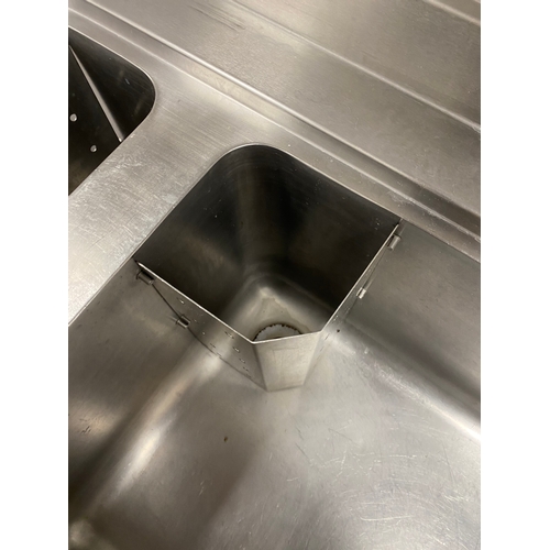 30 - Double stainless steel sink unit with work surface on the left. One mono tape per sink. One shelf un... 