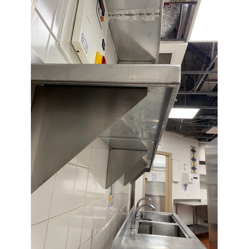 31 - Two stainless steel wall mounted shelving units with four support brackets each. 
 3000mm L 300mm D ... 