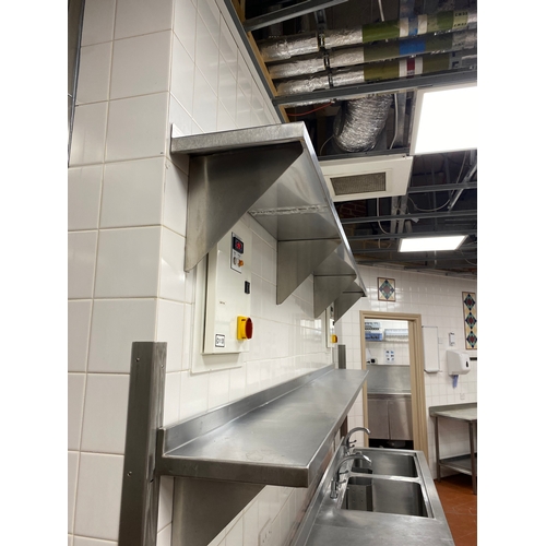 31 - Two stainless steel wall mounted shelving units with four support brackets each. 
 3000mm L 300mm D ... 