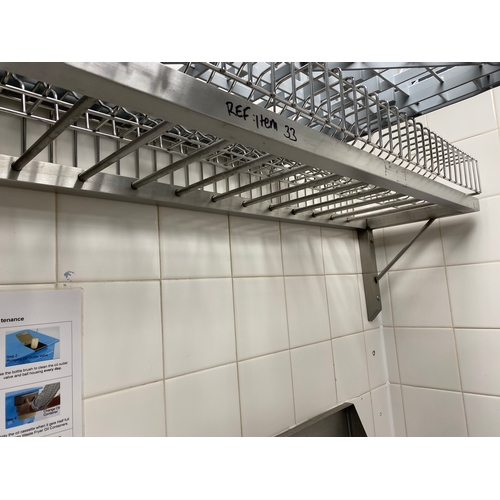 34 - Two stainless steel ladder type wall mounted shelf unit. 
1600mm L 280mm D 300mm H