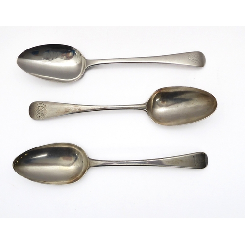 121 - A George III silver Old English pattern tablespoon - Thomas Wallis I, London 1779; together with two... 