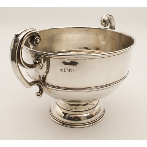 126 - An Edwardian silver rose bowl - Wakely & Wheeler, London 1904, with twin foliate capped scroll handl... 