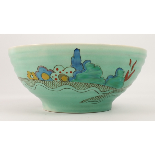 13 - A Clarice Cliff 'Chalet' (no. 633) ribbed bowl - painted with an orange roofed house in a garden lan... 