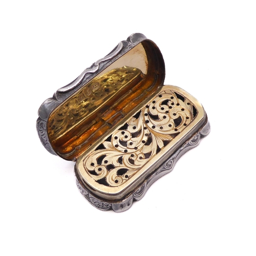 134 - A Victorian silver vinaigrette - Edward Smith, Birmingham 1865, of shaped, rectangular form with eng... 