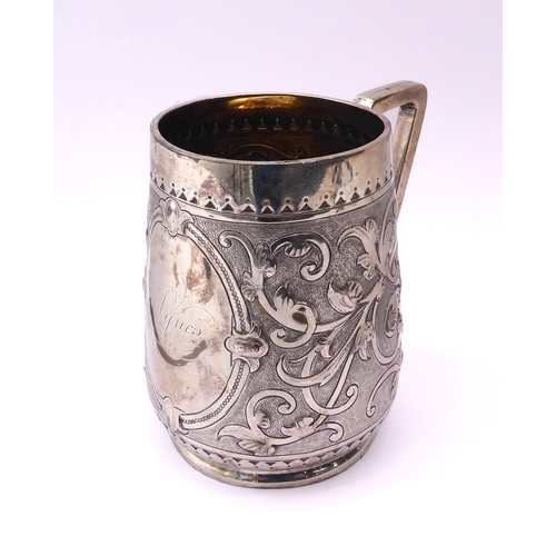 149 - A Victorian silver christening mug - overstruck hallmarks for William Hunter & Son, London 1875, tap... 