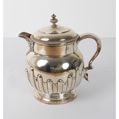 159 - An Edwardian silver jug - Cooper Brothers & Sons Ltd., Sheffield 1905, of globular form with half-fl... 