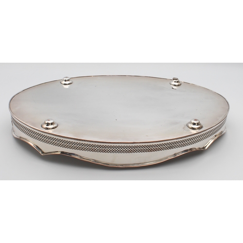 171 - A Regency-style silver-plated copper drinks tray - oval with pierced, serpentine gallery and twin pi... 