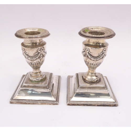 172 - A pair of late-Victorian silver dwarf candlesticks in the Adam style - Barker Brothers, Birmingham 1... 