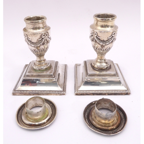 172 - A pair of late-Victorian silver dwarf candlesticks in the Adam style - Barker Brothers, Birmingham 1... 