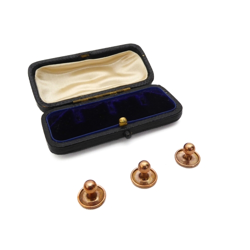 204 - A cased pair of 18ct gold and pearl collar studs - early 20th century, stamped '18', 10mm diameter, ... 