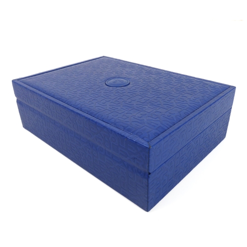 217 - A Rolex blue embossed leather jewellery box - 1980s, ref. 51.00.01, the rectangular box with all ove... 