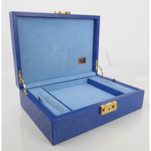 217 - A Rolex blue embossed leather jewellery box - 1980s, ref. 51.00.01, the rectangular box with all ove... 