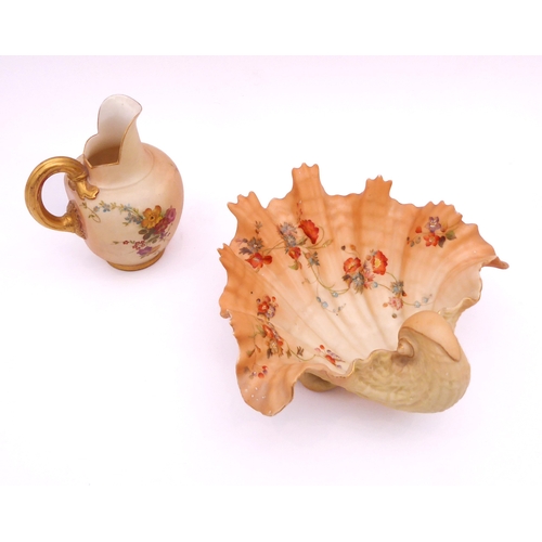 22 - Three pieces of Royal Worcester blush ivory porcelain - comprising a shape 1714 jug with basket weav... 