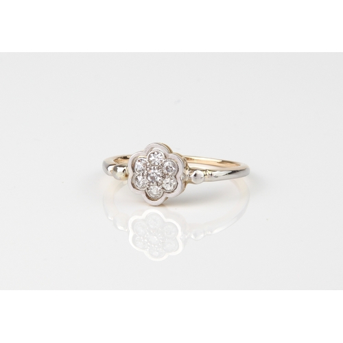 234 - A mid-century 18ct yellow gold, platinum and diamond floral cluster ring - halo set with a floral cl... 