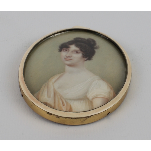 273 - A portrait miniature on ivory of a young lady - 19th century, in a silver-gilt and cream enamel fram... 