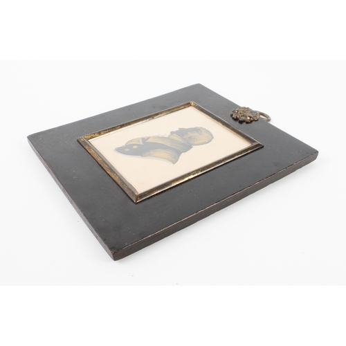 275 - A Regency gilt-highlighted silhouette of a gentleman, 8.5 x 7 cm; frame size 14.8 x 13.1 cm.