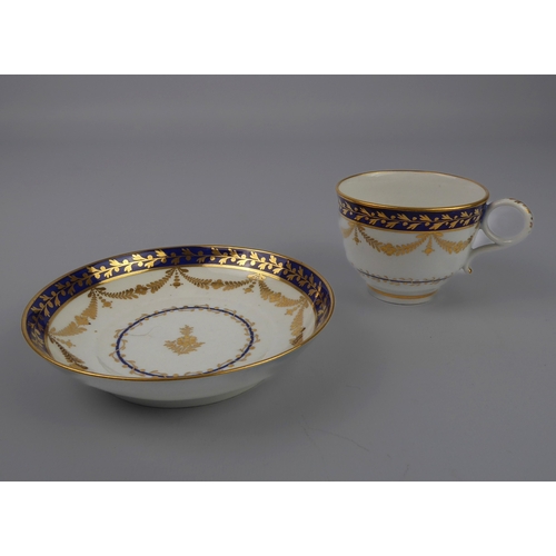 31 - An English porcelain cup and saucer (possibly Worcester), four 19th century coffee cans and two simi... 