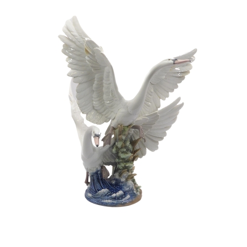 40 - A large and impressive Lladro group titled 'Swans Take Flight' - c.1992, sculpted by Salvador Debón,... 