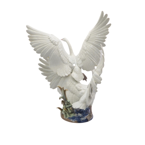 40 - A large and impressive Lladro group titled 'Swans Take Flight' - c.1992, sculpted by Salvador Debón,... 