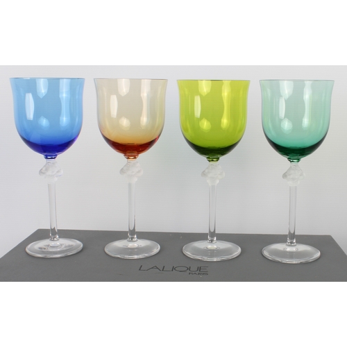 44 - A set of six Lalique Roxane coloured wine glasses - comprising four differently coloured and two cle... 