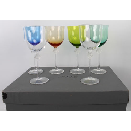 44 - A set of six Lalique Roxane coloured wine glasses - comprising four differently coloured and two cle... 