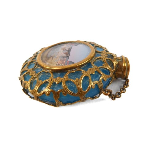 46 - A 19th century blue-glass and gilt-metal moon flask scent bottle - with chatelaine chain and inset r... 