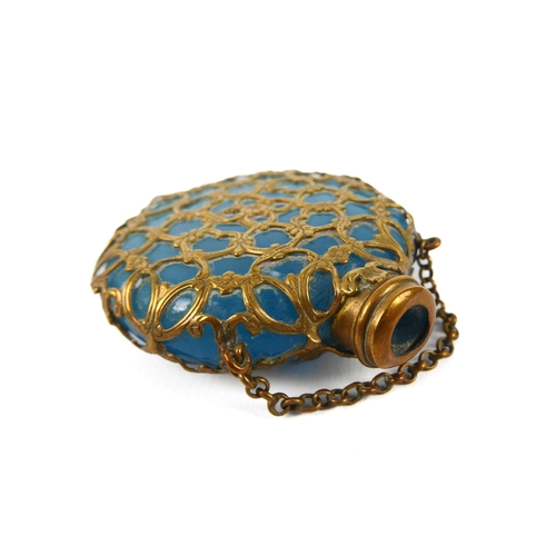 46 - A 19th century blue-glass and gilt-metal moon flask scent bottle - with chatelaine chain and inset r... 