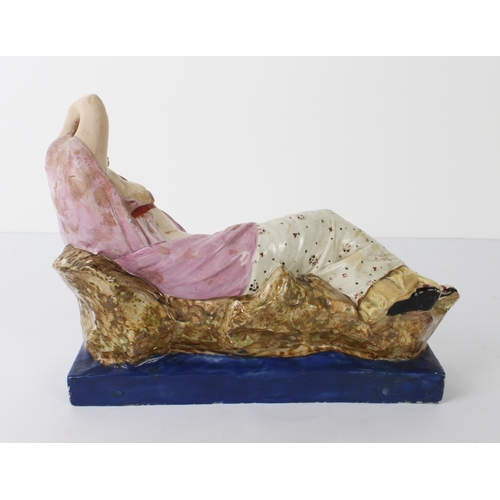 5 - An early 19th century pearlware figure of Cleopatra by Enoch Wood - the reclining figure dressed in ... 