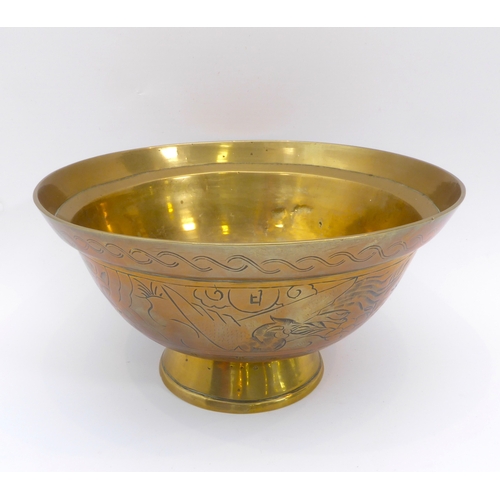 57 - A Chinese bell metal bowl - first half 20th century, with stepped rim and conical foot, chased with ... 