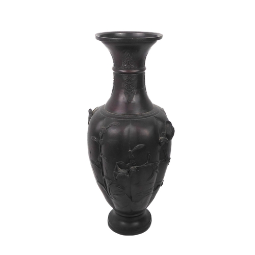 61 - A large Japanese patinated bronze vase - Meiji period (1868-1912), of eight lobed baluster form with... 