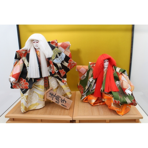 62 - A cased pair of Japanese dolls depicting Ren Jishi actors by Kyugetsu of Tokyo - second half 20th ce... 