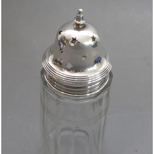 68 - A George V silver and cut glass sugar caster - James Deakin & Sons, Birmingham 1913, the panel cut c... 