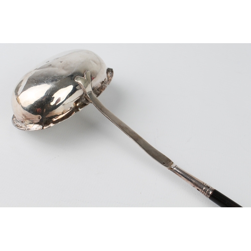 90 - A George IV silver toddy or punch ladle - London 1825, maker's mark rubbed, with chased foliate rose... 