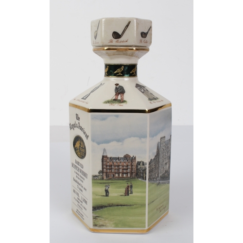 387 - A sealed litre decanter of The Royal & Ancient 20 year old Scotch whisky - decorated with scenes of ... 