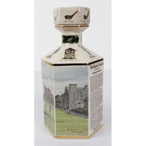 387 - A sealed litre decanter of The Royal & Ancient 20 year old Scotch whisky - decorated with scenes of ... 