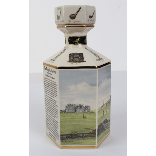 387 - A sealed litre decanter of The Royal & Ancient 20 year old Scotch whisky - decorated with scenes of ... 