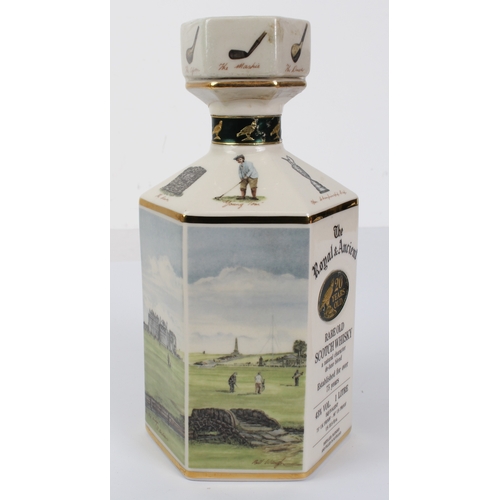 387 - A sealed litre decanter of The Royal & Ancient 20 year old Scotch whisky - decorated with scenes of ... 