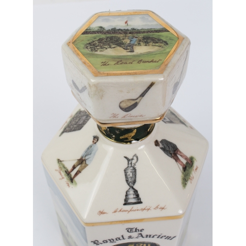 387 - A sealed litre decanter of The Royal & Ancient 20 year old Scotch whisky - decorated with scenes of ... 